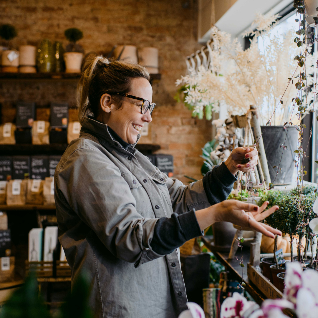 Woman arranging flowers